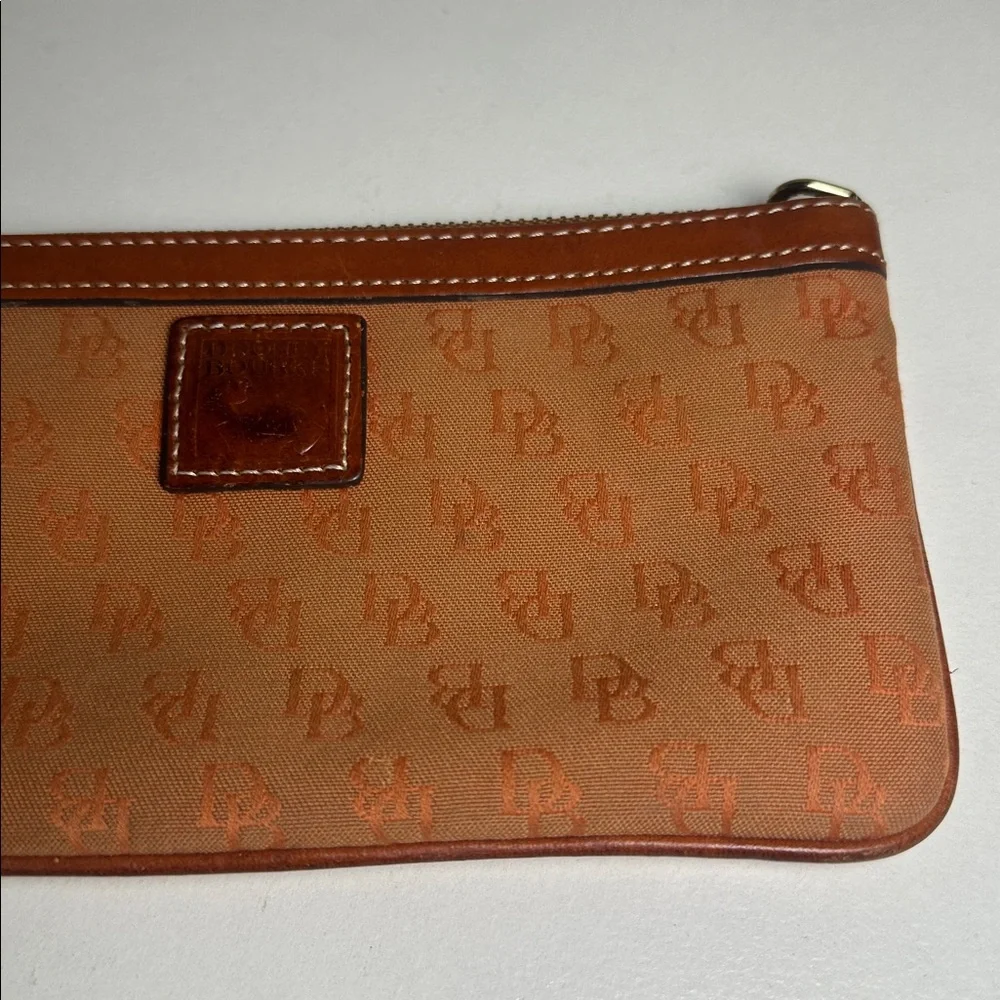 Dooney & Bourke Tan monogram all over print Wristlet